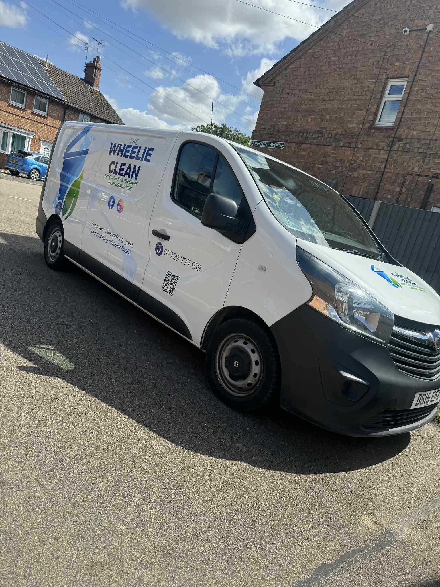A picture of the Wheelie Clean Bin Company's signwritten van.
